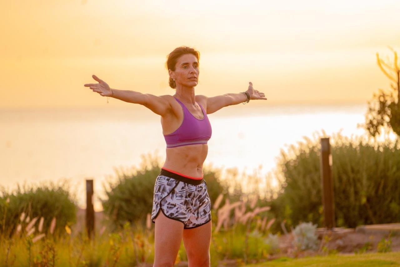 Hotel Hyatt Regency Taghazout Esterno foto A woman wearing a sports bra